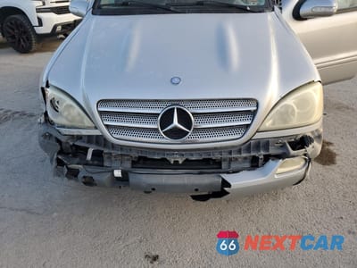 Zdjęcie 12 z 15 samochodu: 2005 MERCEDES-BENZ ML 350 VIN:4JGAB57E65A566688 - miniatura