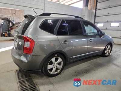 Trzecie zdjęcie samochodu z tyłu: 2009 KIA RONDO LX VIN:KNAFG526297273060 - miniatura