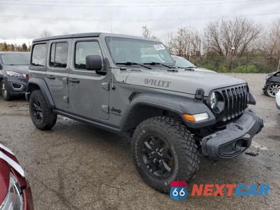 Czwarte zdjęcie samochodu z boku: 2021 JEEP WRANGLER UNLIMITED SPORT VIN:1C4HJXDN4MW791621 - miniatura