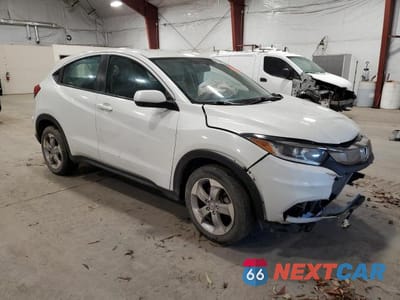 Czwarte zdjęcie samochodu z boku: 2021 HONDA HR-V LX VIN:3CZRU6H3XMM734025 - miniatura