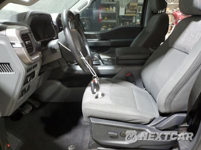 Zdjęcie 7 z 12 samochodu: 2023 FORD F150 LIGHTNING PRO VIN:1FTVW1ELXPWG05356 - miniatura
