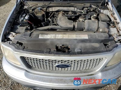 Zdjęcie 11 z 11 samochodu: 2000 FORD F-150 VIN:1FTRX18L2YKA96009 - miniatura