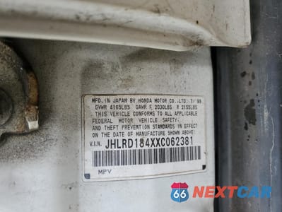 Zdjęcie 14 z 16 samochodu: 1999 HONDA CR-V LX VIN:JHLRD184XXC062381 - miniatura