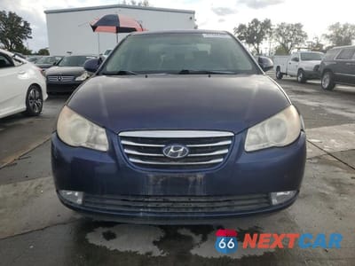 Piąte zdjęcie samochodu w środku: 2010 HYUNDAI ELANTRA BLUE VIN:KMHDU4AD7AU923385 - miniatura