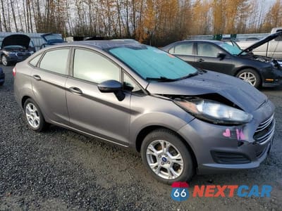 Czwarte zdjęcie samochodu z boku: 2014 FORD FIESTA VIN:3FADP4BJ3EM194995 - miniatura