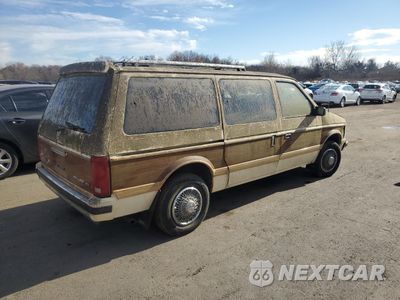 Trzecie zdjęcie samochodu z tyłu: 1985 PLYMOUTH VOYAGER LE VIN:1P4FH5138HX112035 - miniatura