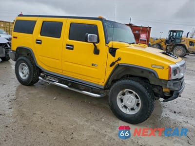 Czwarte zdjęcie samochodu z boku: 2005 HUMMER H2 VIN:5GRGN23U75H132545 - miniatura
