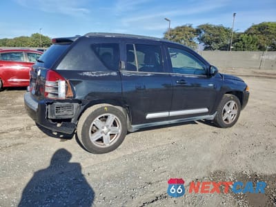 Trzecie zdjęcie samochodu z tyłu: 2010 JEEP COMPASS SPORT VIN:1J4NF1FB7AD675044 - miniatura