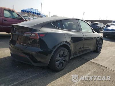 Trzecie zdjęcie samochodu z tyłu: 2024 TESLA Y VIN:7SAYGDEE7RF106408 - miniatura