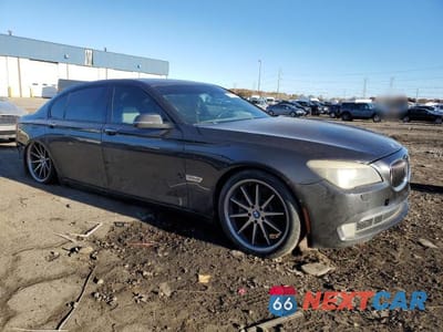 Czwarte zdjęcie samochodu z boku: 2013 BMW 750 LI VIN:WBAYE8C57DD132307 - miniatura