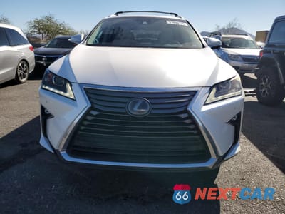 Piąte zdjęcie samochodu w środku: 2019 LEXUS RX 450H BASE VIN:2T2BGMCAXKC033821 - miniatura