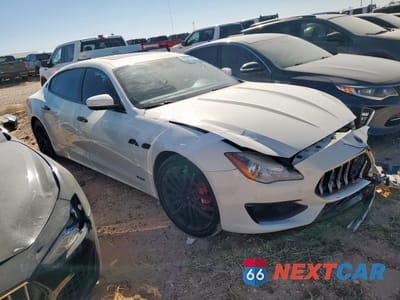 Czwarte zdjęcie samochodu z boku: 2017 MASERATI QUATTROPORTE GTS VIN:ZAM56PPS5H1228629 - miniatura