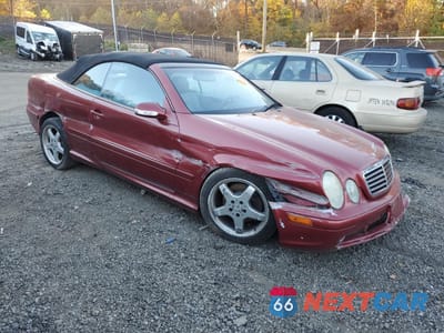 Czwarte zdjęcie samochodu z boku: 2002 MERCEDES-BENZ CLK 430 VIN:WDBLK70G62T112427 - miniatura