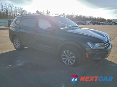 Czwarte zdjęcie samochodu z boku: 2018 VOLKSWAGEN TIGUAN S VIN:3VV1B7AX5JM037399 - miniatura