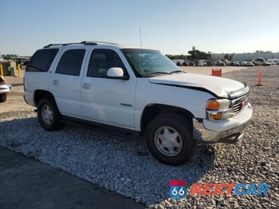 Czwarte zdjęcie samochodu z boku: 2003 GMC YUKON VIN:1GKEC13V33R222112 - miniatura