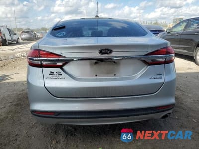 Zdjęcie 6 z 12 samochodu: 2017 FORD FUSION SE HYBRID VIN:3FA6P0LU3HR141571 - miniatura