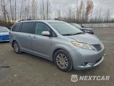 Czwarte zdjęcie samochodu z boku: 2012 TOYOTA SIENNA XLE VIN:5TDYK3DCXCS224882 - miniatura