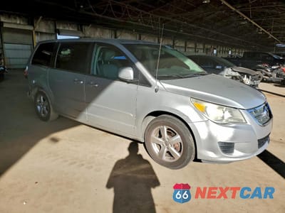 Czwarte zdjęcie samochodu z boku: 2010 VOLKSWAGEN ROUTAN SE VIN:2V4RW3D12AR268314 - miniatura