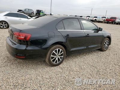 Trzecie zdjęcie samochodu z tyłu: 2017 VOLKSWAGEN JETTA SE VIN:3VWDB7AJ8HM334620 - miniatura