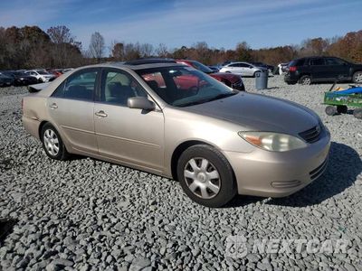 Czwarte zdjęcie samochodu z boku: 2002 TOYOTA CAMRY LE VIN:4T1BE32K02U555788 - miniatura