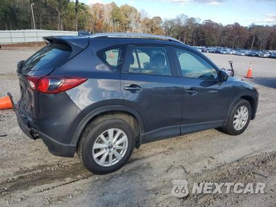 Trzecie zdjęcie samochodu z tyłu: 2014 MAZDA CX-5 SPORT VIN:JM3KE2BE5E0301456 - miniatura