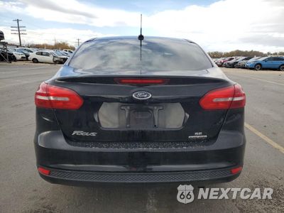 Zdjęcie 6 z 14 samochodu: 2016 FORD FOCUS SE VIN:1FADP3F23GL377833 - miniatura