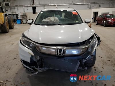 Piąte zdjęcie samochodu w środku: 2021 HONDA HR-V LX VIN:3CZRU6H3XMM734025 - miniatura