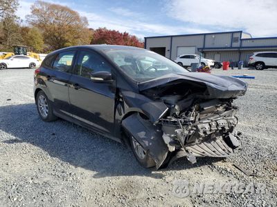 Czwarte zdjęcie samochodu z boku: 2017 FORD FOCUS SE VIN:1FADP3K22HL282509 - miniatura