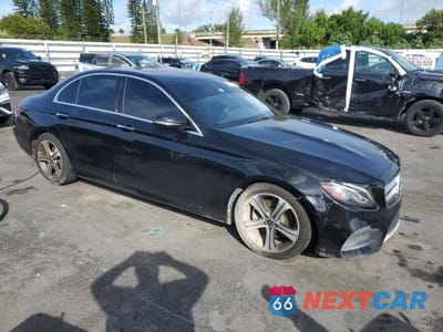 Czwarte zdjęcie samochodu z boku: 2018 MERCEDES-BENZ E 300 VIN:WDDZF4JB3JA389196 - miniatura
