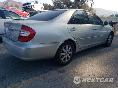 Trzecie zdjęcie samochodu z tyłu: 2003 TOYOTA CAMRY LE VIN:4T1BE30K13U751999 - miniatura