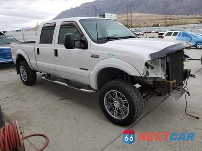 Czwarte zdjęcie samochodu z boku: 2001 FORD F250 SUPER DUTY VIN:3FTNW21F61MA12252 - miniatura