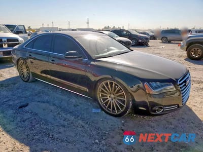 Czwarte zdjęcie samochodu z boku: 2011 AUDI A8 QUATTRO VIN:WAUAVAFDXBN002010 - miniatura