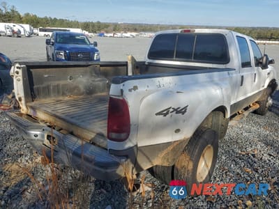 Trzecie zdjęcie samochodu z tyłu: 2002 FORD F350 SUPER DUTY VIN:1FTWW33FX2ED06946 - miniatura