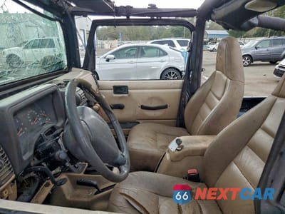 Zdjęcie 7 z 11 samochodu: 2002 JEEP WRANGLER / TJ SPORT VIN:1J4FA49S72P713727 - miniatura