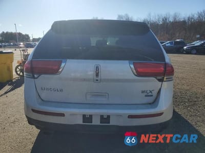 Zdjęcie 6 z 12 samochodu: 2013 LINCOLN MKX VIN:2LMDJ8JK2DBL24021 - miniatura