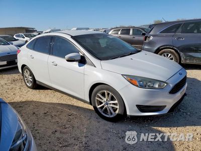Czwarte zdjęcie samochodu z boku: 2017 FORD FOCUS SE VIN:1FADP3F22HL210249 - miniatura