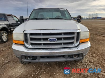 Piąte zdjęcie samochodu w środku: 1999 FORD F250 SUPER DUTY VIN:1FTNX21S3XEE33516 - miniatura