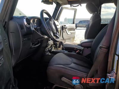 Zdjęcie 7 z 12 samochodu: 2015 JEEP WRANGLER UNLIMITED RUBICON VIN:1C4BJWFG8FL638789 - miniatura