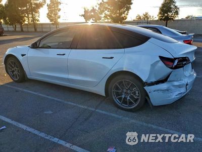Trzecie zdjęcie samochodu z tyłu: 2021 TESLA MODEL 3 VIN:5YJ3E1EA6MF078506 - miniatura