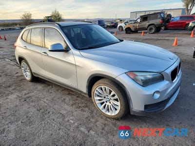 Czwarte zdjęcie samochodu z boku: 2014 BMW X1 SDRIVE28I VIN:WBAVM1C57EVW52208 - miniatura