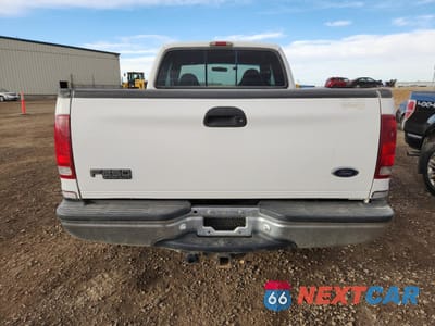 Zdjęcie 6 z 12 samochodu: 1999 FORD F250 SUPER DUTY VIN:1FTNX21S3XEE33516 - miniatura