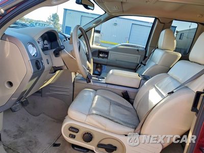Zdjęcie 7 z 12 samochodu: 2004 FORD F150 VIN:1FTPX12574NB13090 - miniatura