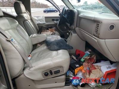 Zdjęcie 7 z 14 samochodu: 2001 CHEVROLET TAHOE K1500 VIN:1GNEK13T31J256843 - miniatura