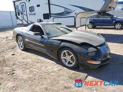 Czwarte zdjęcie samochodu z boku: 2004 CHEVROLET CORVETTE VIN:1G1YY22G345133404 - miniatura