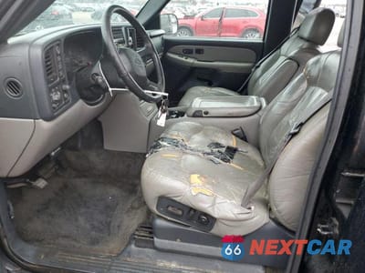 Zdjęcie 7 z 13 samochodu: 2001 CHEVROLET TAHOE K1500 VIN:1GNEK13T71J255341 - miniatura