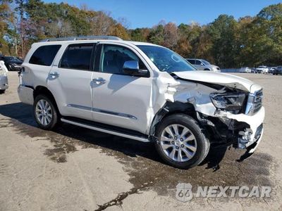 Czwarte zdjęcie samochodu z boku: 2019 TOYOTA SEQUOIA PLATINUM VIN:5TDDY5G14KS171632 - miniatura