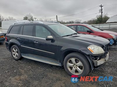 Czwarte zdjęcie samochodu z boku: 2010 MERCEDES-BENZ GL 450 4MATIC VIN:4JGBF7BE1AA575451 - miniatura