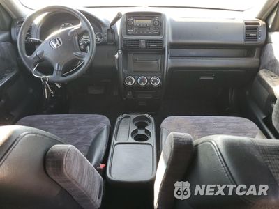 Zdjęcie 8 z 14 samochodu: 2004 HONDA CR-V LX VIN:JHLRD68564C024244 - miniatura