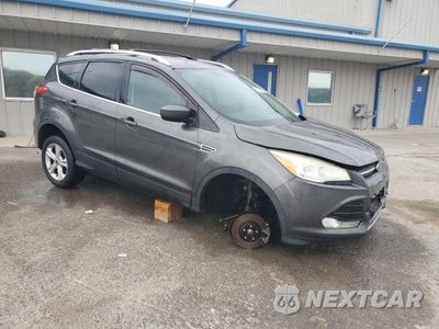 Czwarte zdjęcie samochodu z boku: 2015 FORD ESCAPE VIN:1FMCU0GXXFUB14136 - miniatura