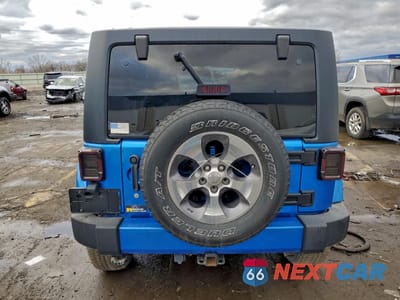 Zdjęcie 6 z 13 samochodu: 2016 JEEP WRANGLER UNLIMITED SAHARA VIN:1C4BJWEG5GL310295 - miniatura